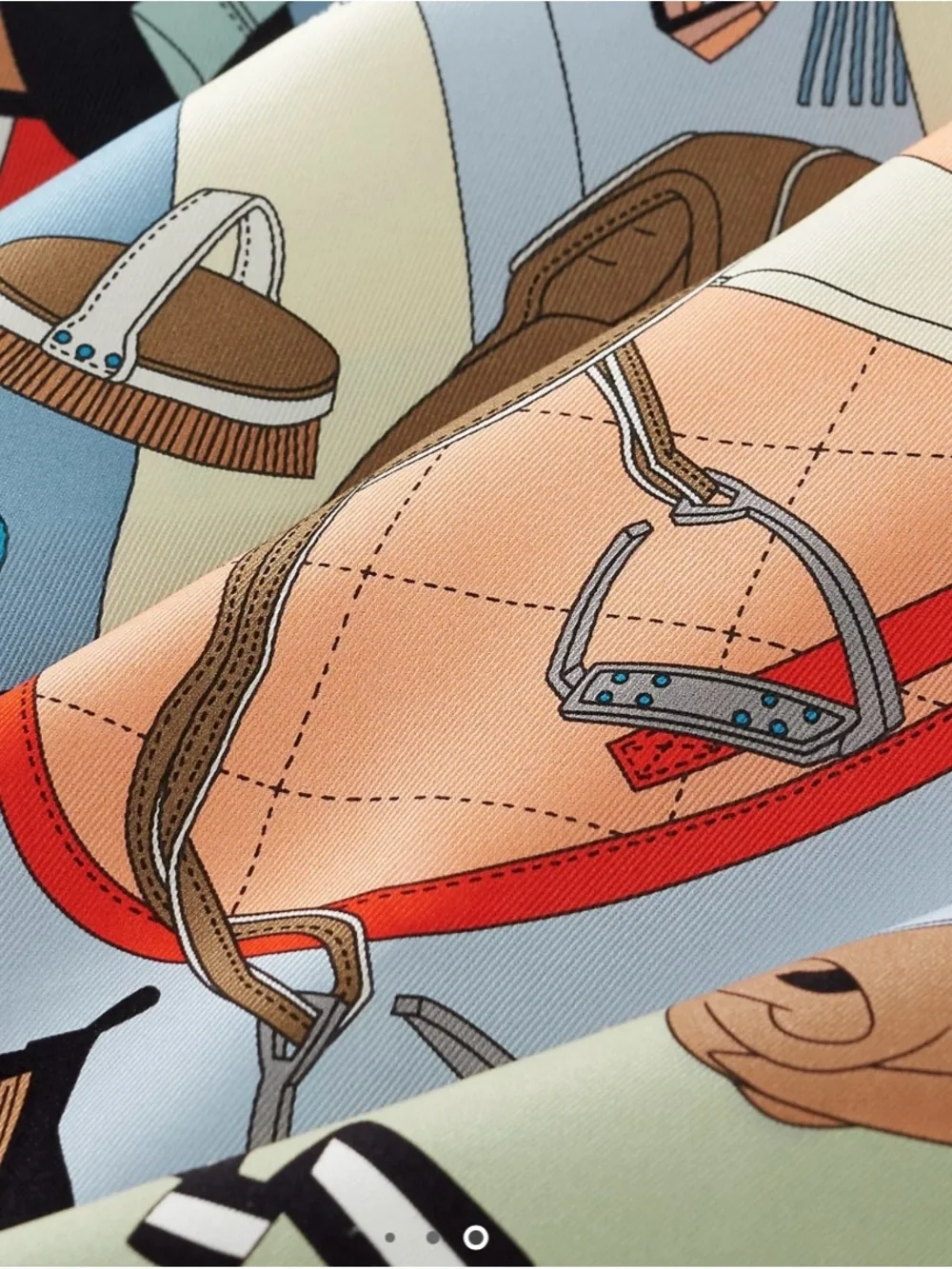 Hermes Pele Mele Silk Scarf with leather buckle.